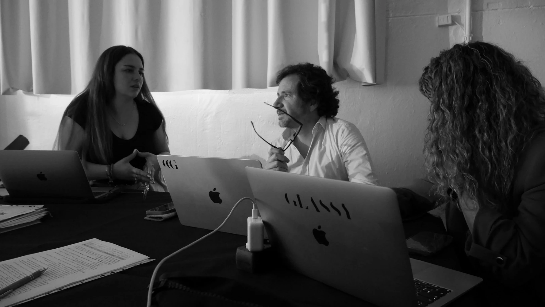 Glassy Films team at the production table with laptops during a Tasty Studio shoot